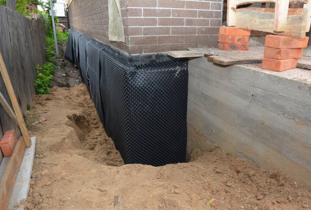 SJ Waterproofing Pros technician performing targeted Emergency Waterproofing assessment in Westerville, OH